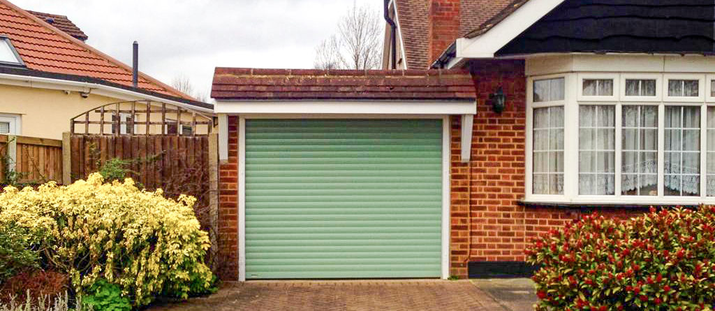 Sws Seceuroglide Automated Roller Garage Door Finished In Chartwell Green