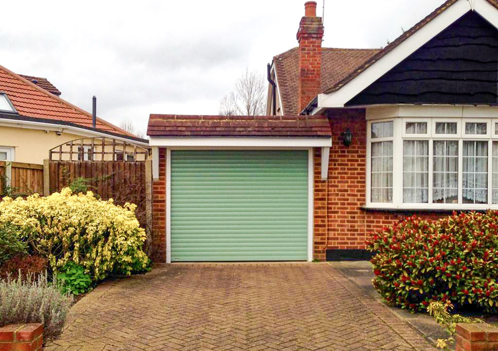 SWS SeceuroGlide Automated Roller Garage Door Finished in Chartwell Green