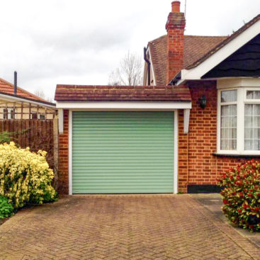 SWS SeceuroGlide Automated Roller Garage Door Finished in Chartwell Green