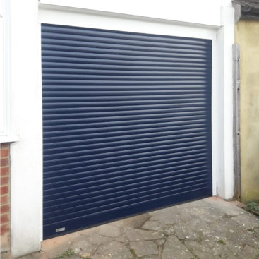 SeceuroGlide Fully Automated Compact Insulated Roller Garage Door finished In Navy Blue