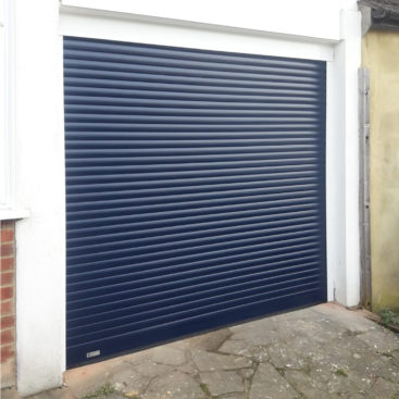 SeceuroGlide Fully Automated Compact Insulated Roller Garage Door finished In Navy Blue