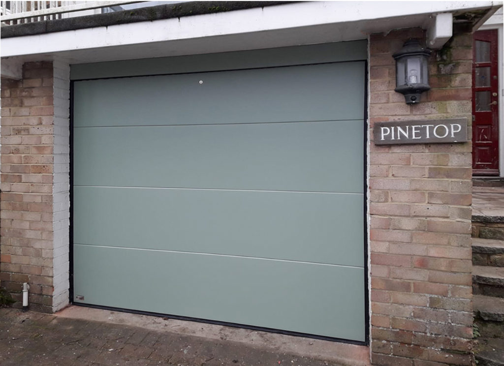 SWS Elite Insulated Sectional Garage Door Finished in Chartwell Green
