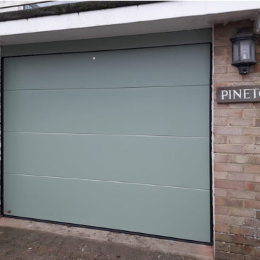 SWS Elite Insulated Sectional Garage Door Finished in Chartwell Green