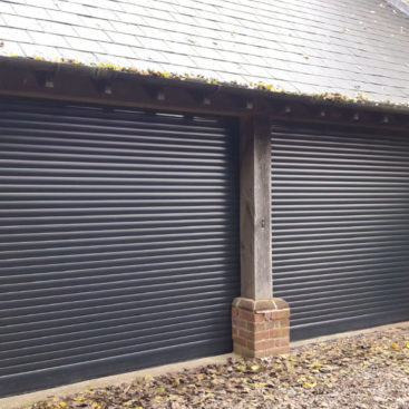 SeceuroGlide Compact Roller Garage Doors finished In Anthracite Grey