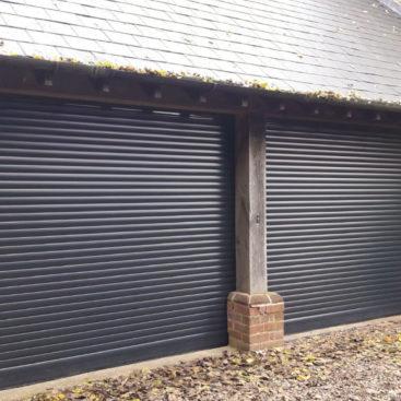 SeceuroGlide Compact Roller Garage Doors finished In Anthracite Grey
