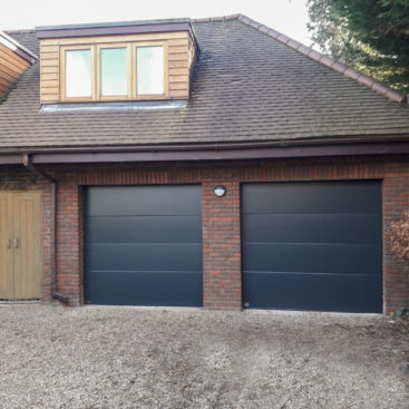 2x SWS Elite Automated Unribbed Sectional Garage Doors Finished in Anthracite Gre