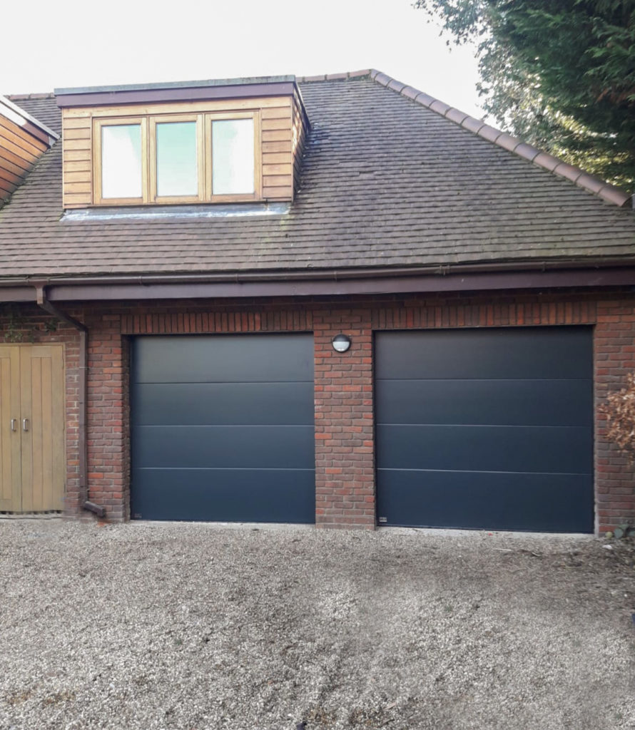 2x SWS Elite Automated Unribbed Sectional Garage Doors Finished in Anthracite Gre