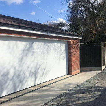 SWS Plus Automated Double Insulated L Ribbed Sectional Garage Door Finished in Traffic White