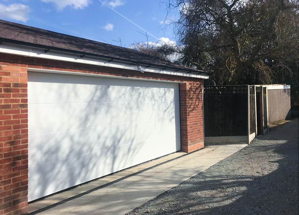 SWS Plus Automated Double Insulated L Ribbed Sectional Garage Door Finished in Traffic White