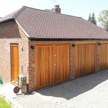 Woodrite timber side hinged garage doors