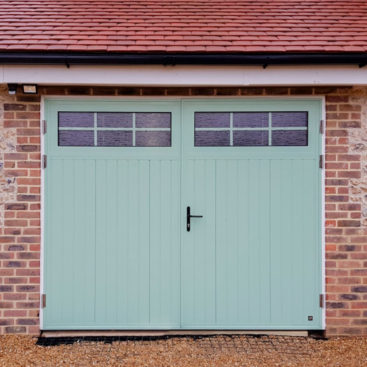 Ryterna 50/50 Traditional, Insulated, Vertical Ribbed, Side Hinged Garage Door