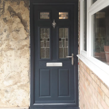 Truedor Matisse Composite Entrance Door with Prairie Glazing Finished in Anthracite Grey