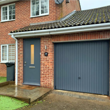 Hormann 2001 Canopy Steel Up & Over Garage Door & Truedor TR1W Entrance Door Finished in Slate Grey