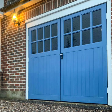 Wessex Sherwood Wood Grain GRP Side Hinged Garage Doors Finished in Wedgewood