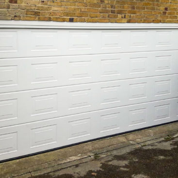 Hormann LPU42 Georgian Sectional Garage Door in White Woodgrain