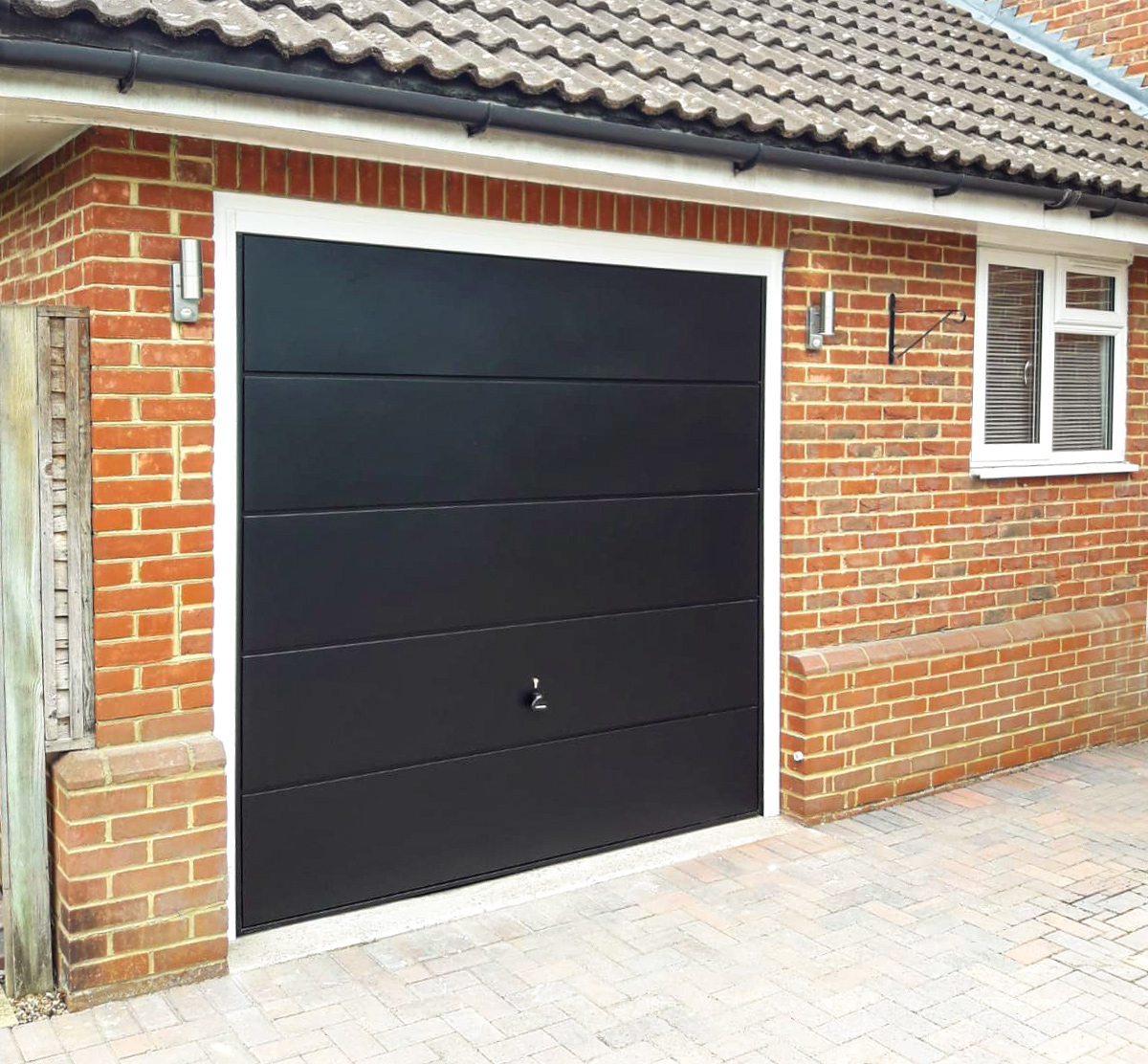 Garador Ascot Wide Horizontally Ribbed Canopy Up and Over Garage Door in Black