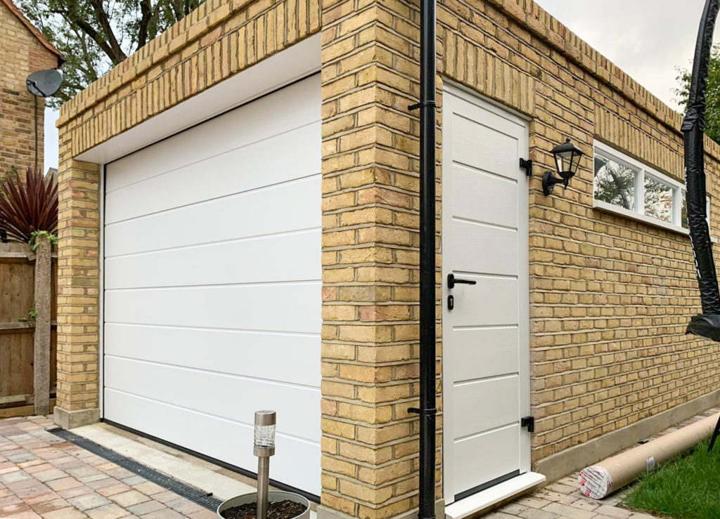 Hormann LPU42 sectional garage door and NT60 side door