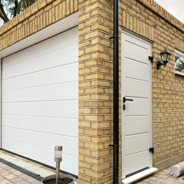 Hormann LPU42 sectional garage door and NT60 side door