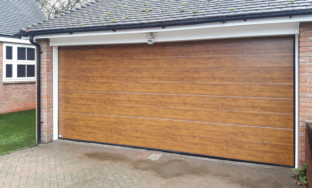 SeceuroGlide Elite Steel Sectional Garage Door in Golden Oak