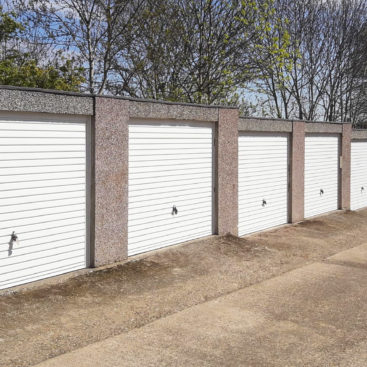 A row of 9 Hormann 2002 Horizontal Up and Over Garage Doors