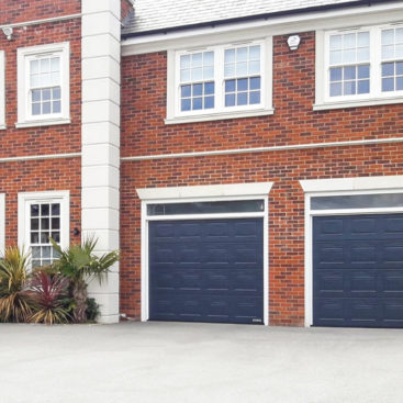 Hormann LPU42 S-Panelled Sectional Garage Doors in Anthracite Grey Woodgrain