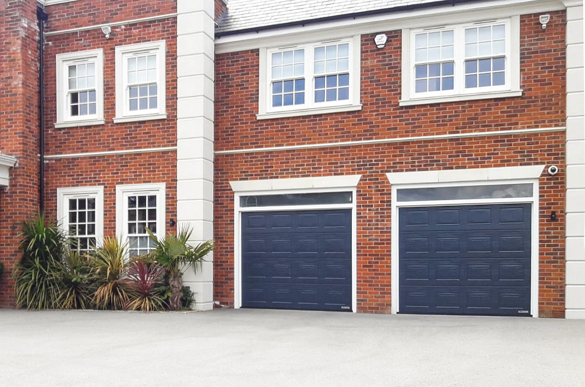 Hormann LPU42 S-Panelled Sectional Garage Doors in Anthracite Grey Woodgrain