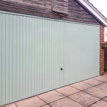 Garador Carlton Steel Retractable Double Up-and-Over Garage Door in Chartwell Green