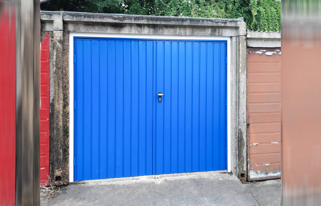Fort Vertical Steel Side Hinged Garage Door in Signal Blue