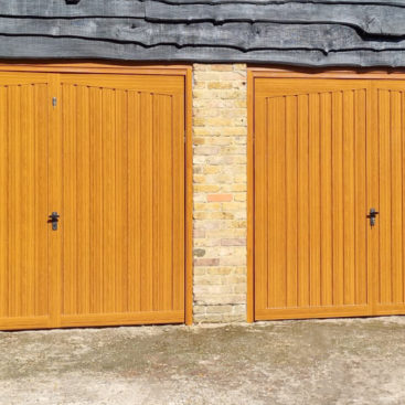 Fort Alton Retractable Garage Doors Finished in Golden Oak