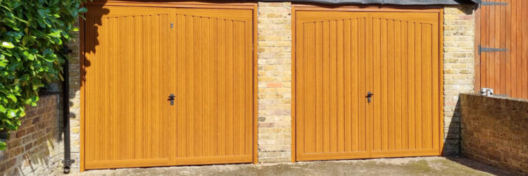 Fort Alton Retractable Garage Doors Finished in Golden Oak