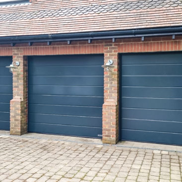 A Trio of Hormann LPU42 M-Ribbed Insulated Sectional Garage Doors