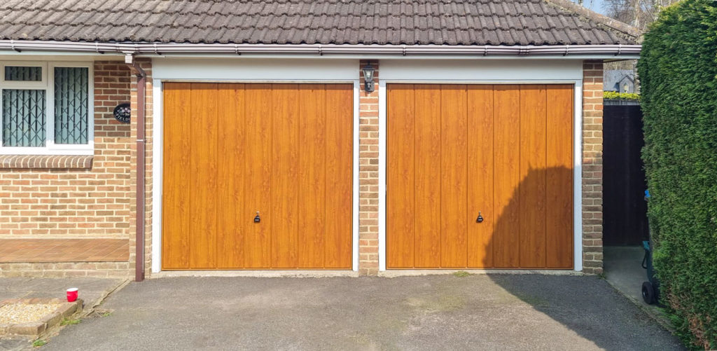 Garador Sherwood Steel Timber Effect Up & Over Canopy Garage Doors in Golden Oak