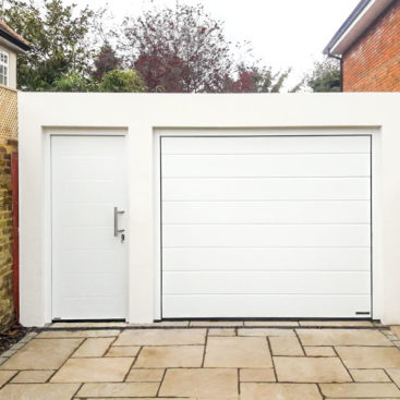 Hormann LPU42 M-Ribbed Sectional Garage door and Thermo 65 Front Door in White