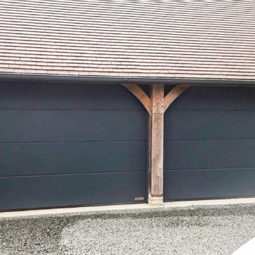 Hormann LPU42 L-Ribbed Insulated Steel Sectional Garage Doors in Anthracite Sandgrain