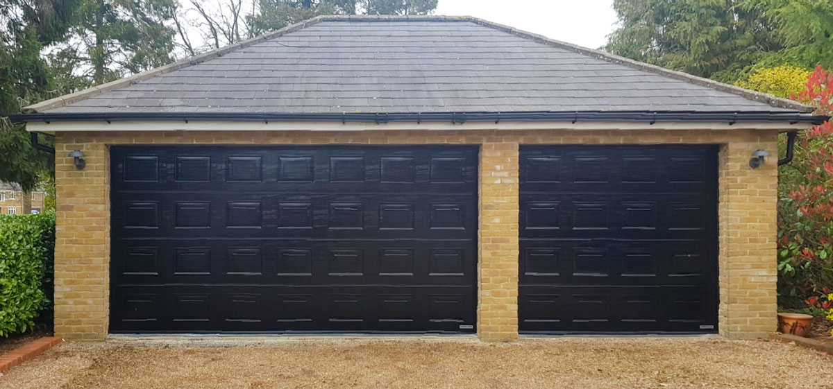 Hormann LPU42 Sectional Doors in Black Woodgrain