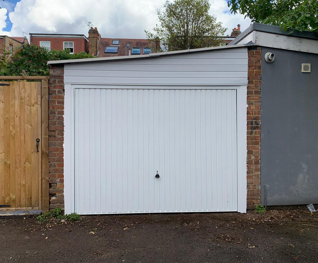 Garador Carlton Vertically Ribbed Retractable Up & Over Garage Door Finished in White