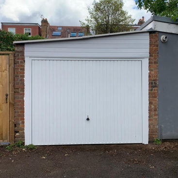 Garador Carlton Vertically Ribbed Retractable Up & Over Garage Door Finished in White