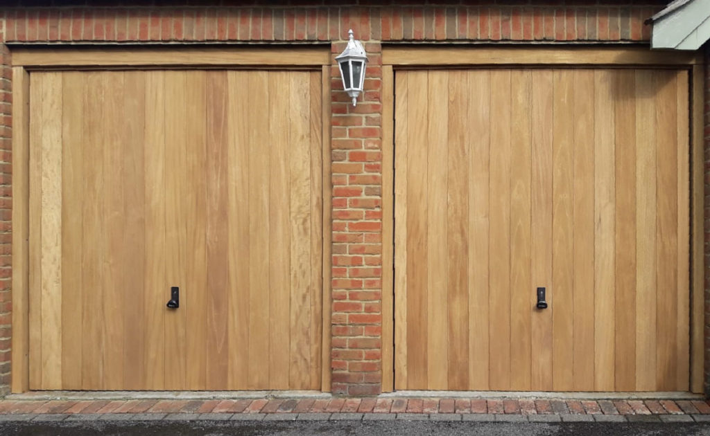 2 x Woodrite Wawrick Thames, wide-vertical boarded, Idigbo canopy garage doors