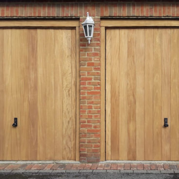 2 x Woodrite Wawrick Thames, wide-vertical boarded, Idigbo canopy garage doors