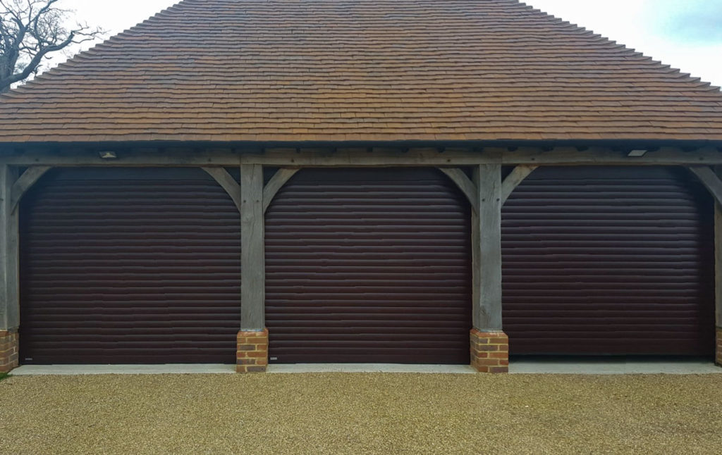 3 x SWS Securoglide Roller Garage Doors in a Rosewood Woodgrain