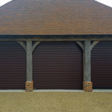 3 x SWS Securoglide Roller Garage Doors in a Rosewood Woodgrain