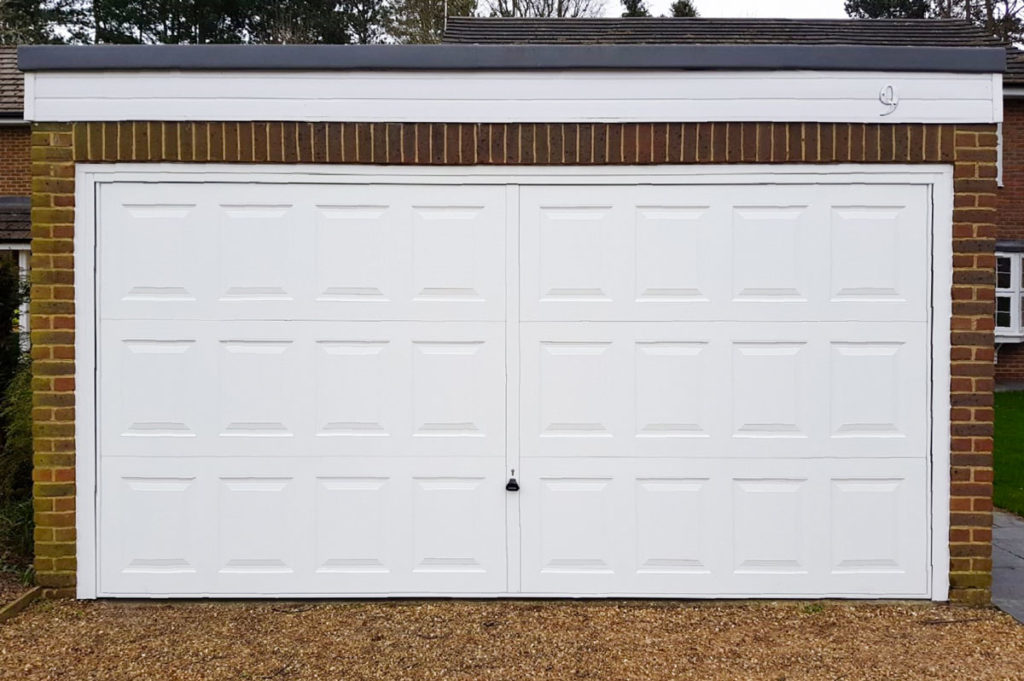 Garador Georgian Double Retractable Garage Door finished in “Traffic White”