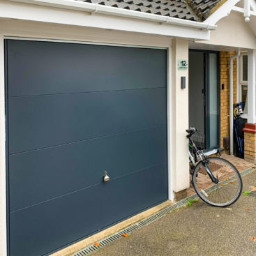 Garador Design 100 Wide Ribbed Steel Canopy Up & Over Garage Door Finished in Anthracite Grey