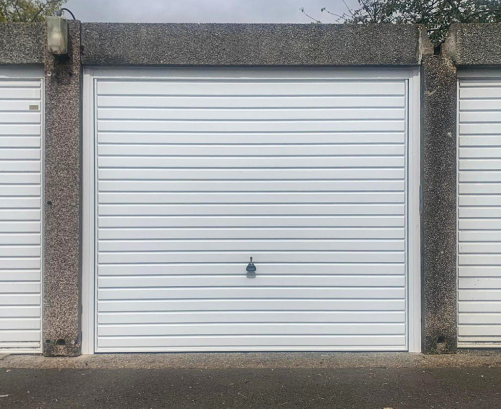 This Garador Steel Up & Over Garage Door Finished in White