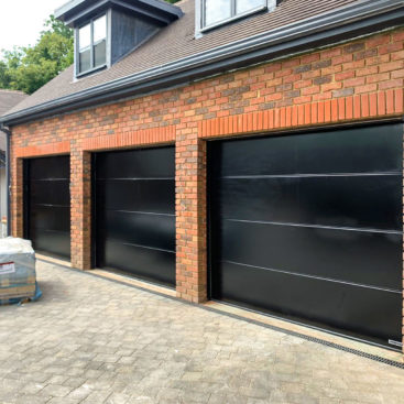 3x Hormann LPU42 L-Ribbed Insulated Sectional Garage Doors finished in Black